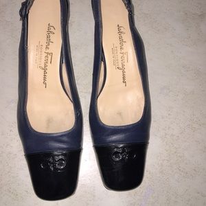 Salvatore Ferragamo black and Navy sling backs.